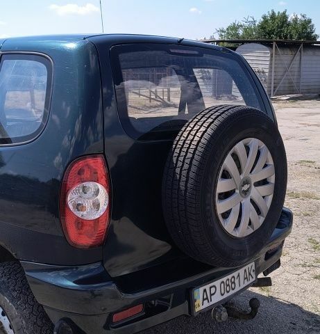 Зелений Шевроле Нива, об'ємом двигуна 1.7 л та пробігом 280 тис. км за 2000 $, фото 5 на Automoto.ua