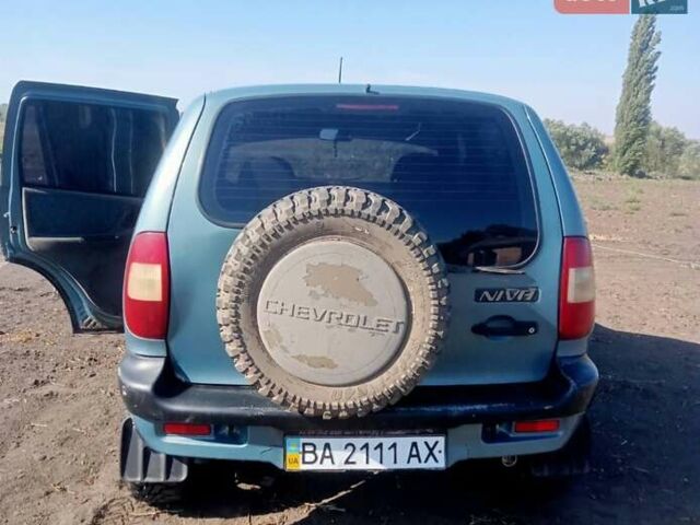 Зеленый Шевроле Нива, объемом двигателя 1.69 л и пробегом 244 тыс. км за 3200 $, фото 3 на Automoto.ua