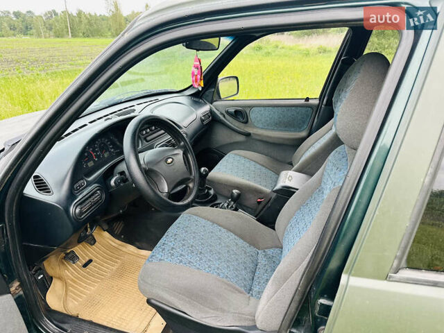 Зеленый Шевроле Нива, объемом двигателя 1.69 л и пробегом 136 тыс. км за 3200 $, фото 7 на Automoto.ua