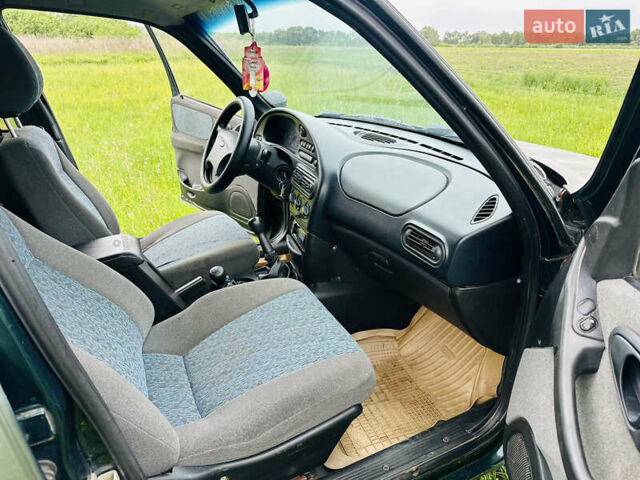 Зеленый Шевроле Нива, объемом двигателя 1.69 л и пробегом 136 тыс. км за 3200 $, фото 8 на Automoto.ua