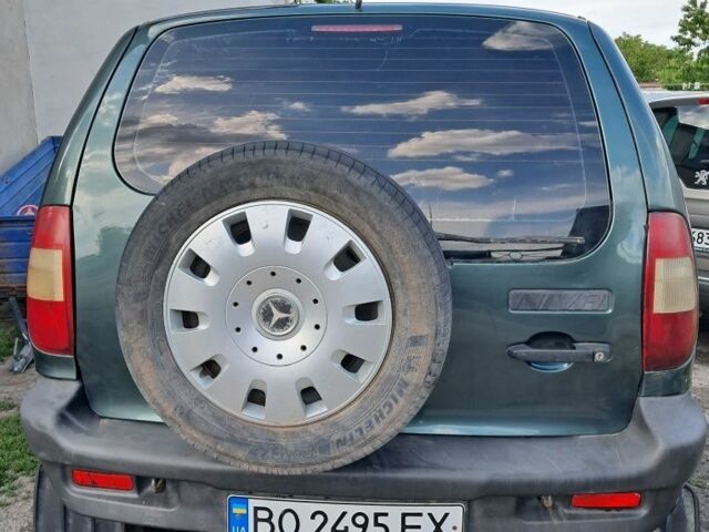 Зелений Шевроле Нива, об'ємом двигуна 1.7 л та пробігом 220 тис. км за 2999 $, фото 3 на Automoto.ua