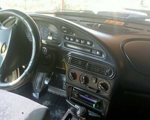 Зеленый Шевроле Нива, объемом двигателя 1.69 л и пробегом 244 тыс. км за 3200 $, фото 8 на Automoto.ua