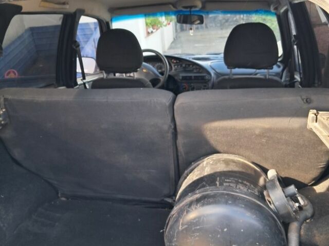 Зелений Шевроле Нива, об'ємом двигуна 1.7 л та пробігом 220 тис. км за 2999 $, фото 6 на Automoto.ua