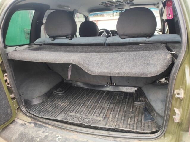 Зеленый Шевроле Нива, объемом двигателя 1.7 л и пробегом 310 тыс. км за 4000 $, фото 9 на Automoto.ua