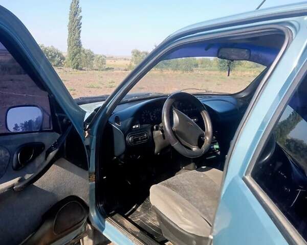 Зеленый Шевроле Нива, объемом двигателя 1.69 л и пробегом 244 тыс. км за 3200 $, фото 5 на Automoto.ua