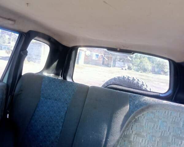 Зеленый Шевроле Нива, объемом двигателя 1.69 л и пробегом 244 тыс. км за 3200 $, фото 4 на Automoto.ua