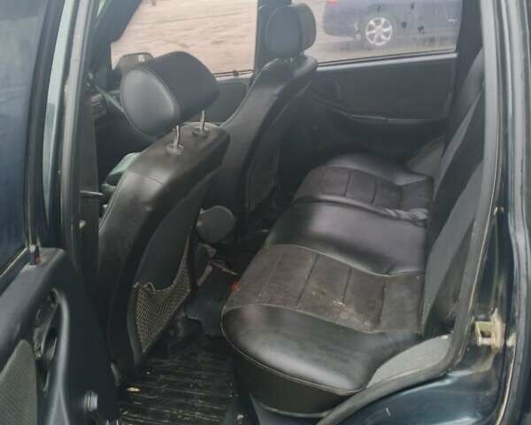 Зеленый Шевроле Нива, объемом двигателя 1.7 л и пробегом 233 тыс. км за 3000 $, фото 2 на Automoto.ua