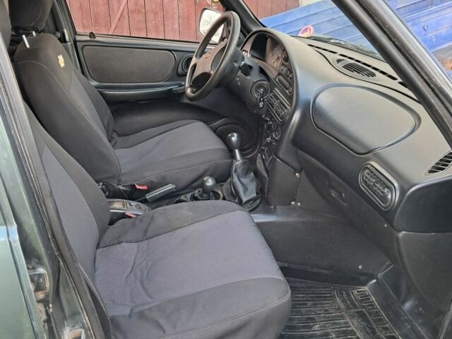 Зелений Шевроле Нива, об'ємом двигуна 1.7 л та пробігом 220 тис. км за 2999 $, фото 4 на Automoto.ua