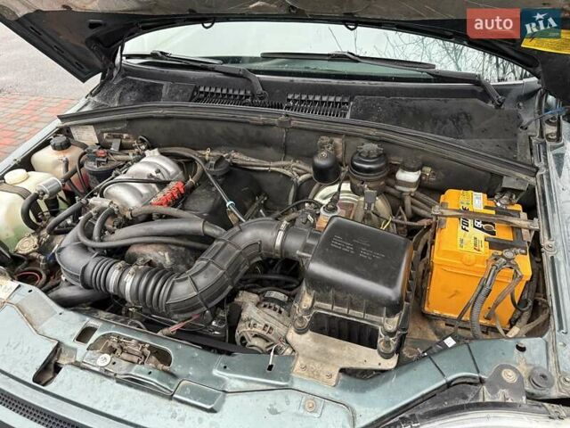 Зеленый Шевроле Нива, объемом двигателя 1.69 л и пробегом 260 тыс. км за 4000 $, фото 3 на Automoto.ua