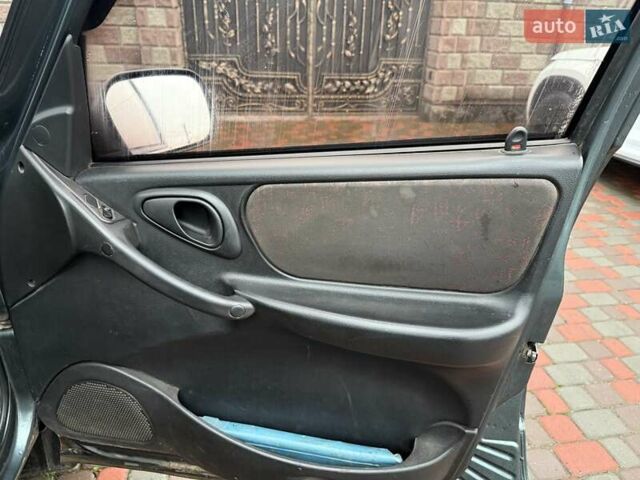 Зеленый Шевроле Нива, объемом двигателя 1.69 л и пробегом 260 тыс. км за 4000 $, фото 2 на Automoto.ua