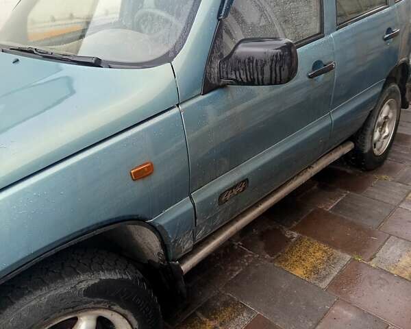 Зеленый Шевроле Нива, объемом двигателя 1.69 л и пробегом 254 тыс. км за 3500 $, фото 2 на Automoto.ua