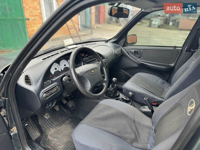 Зелений Шевроле Нива, об'ємом двигуна 1.7 л та пробігом 44 тис. км за 6000 $, фото 9 на Automoto.ua