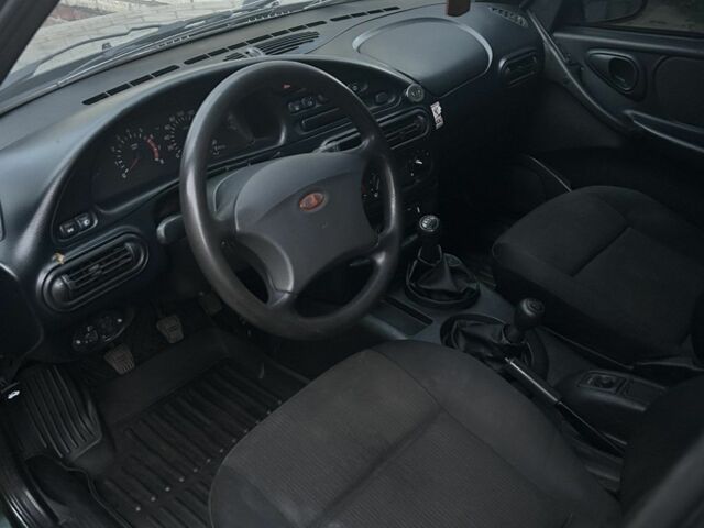 Зеленый Шевроле Нива, объемом двигателя 1.7 л и пробегом 230 тыс. км за 3335 $, фото 3 на Automoto.ua