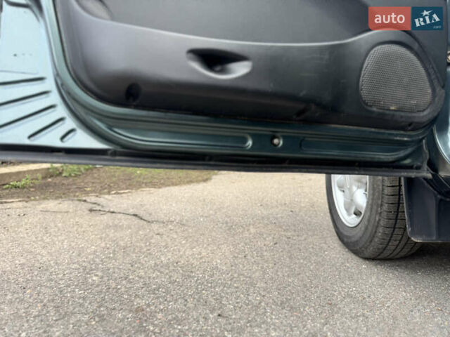 Зелений Шевроле Нива, об'ємом двигуна 1.7 л та пробігом 44 тис. км за 6000 $, фото 14 на Automoto.ua