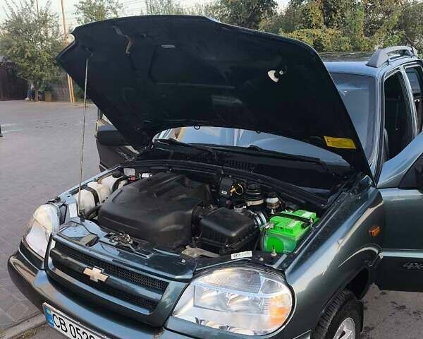 Зеленый Шевроле Нива, объемом двигателя 1.69 л и пробегом 88 тыс. км за 5800 $, фото 10 на Automoto.ua