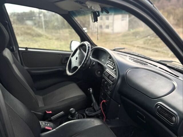 Зеленый Шевроле Нива, объемом двигателя 1.7 л и пробегом 127 тыс. км за 2200 $, фото 3 на Automoto.ua