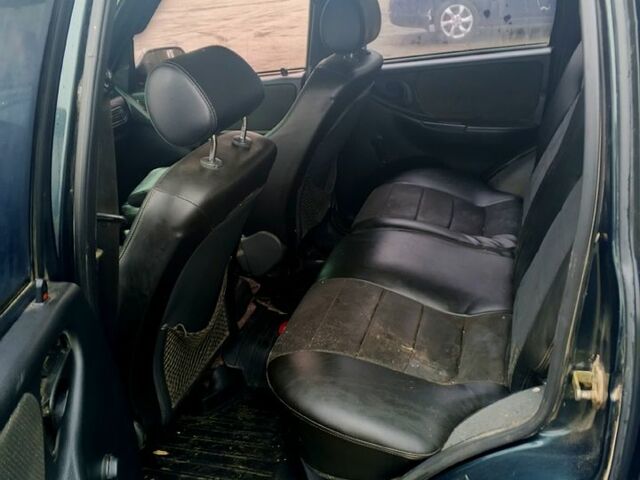 Зеленый Шевроле Нива, объемом двигателя 1.7 л и пробегом 227 тыс. км за 3000 $, фото 3 на Automoto.ua