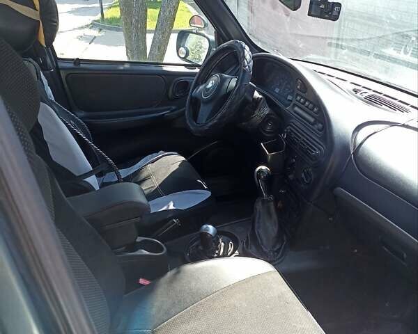 Зелений Шевроле Нива, об'ємом двигуна 1.69 л та пробігом 254 тис. км за 4000 $, фото 1 на Automoto.ua