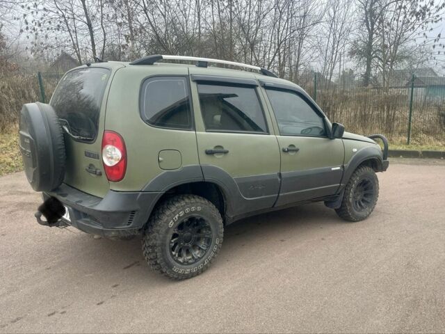 Зелений Шевроле Нива, об'ємом двигуна 1.7 л та пробігом 228 тис. км за 4750 $, фото 5 на Automoto.ua