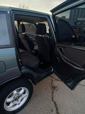 Зеленый Шевроле Нива, объемом двигателя 1.69 л и пробегом 142 тыс. км за 6500 $, фото 4 на Automoto.ua