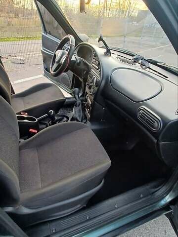 Зеленый Шевроле Нива, объемом двигателя 1.69 л и пробегом 142 тыс. км за 6500 $, фото 6 на Automoto.ua