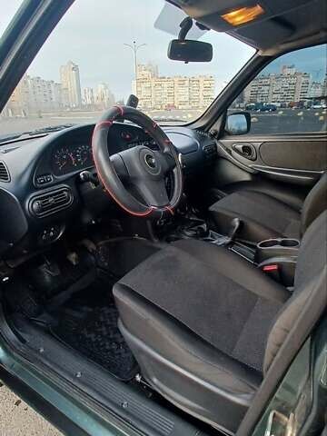 Зеленый Шевроле Нива, объемом двигателя 1.69 л и пробегом 142 тыс. км за 6500 $, фото 7 на Automoto.ua