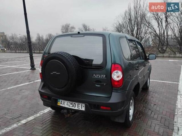 Зеленый Шевроле Нива, объемом двигателя 1.69 л и пробегом 103 тыс. км за 6900 $, фото 2 на Automoto.ua