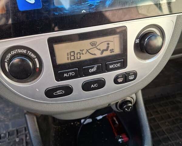 Белый Шевроле Нубира, объемом двигателя 1.99 л и пробегом 230 тыс. км за 4900 $, фото 11 на Automoto.ua