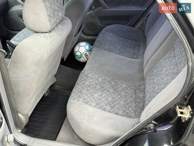 Черный Шевроле Нубира, объемом двигателя 1.8 л и пробегом 171 тыс. км за 4300 $, фото 16 на Automoto.ua