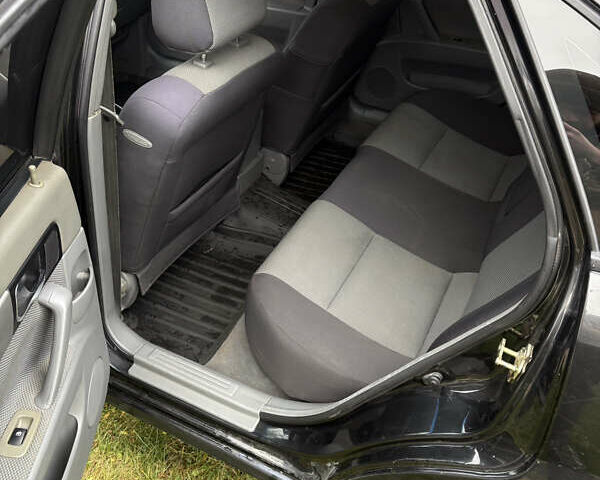 Черный Шевроле Нубира, объемом двигателя 1.8 л и пробегом 221 тыс. км за 4700 $, фото 14 на Automoto.ua