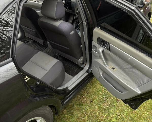 Черный Шевроле Нубира, объемом двигателя 1.8 л и пробегом 221 тыс. км за 4700 $, фото 16 на Automoto.ua