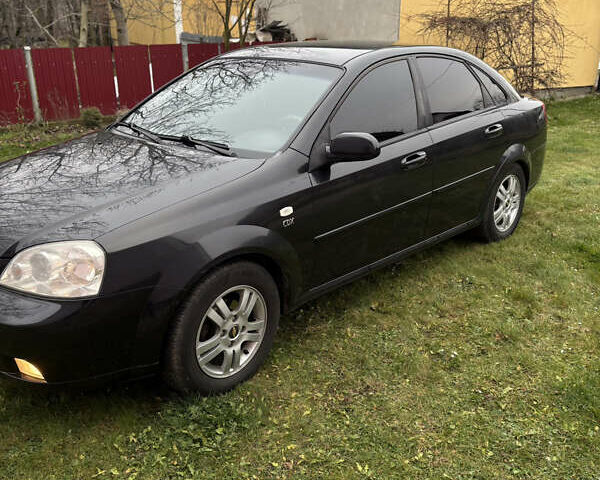 Черный Шевроле Нубира, объемом двигателя 1.8 л и пробегом 221 тыс. км за 4700 $, фото 2 на Automoto.ua