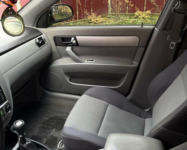 Черный Шевроле Нубира, объемом двигателя 1.8 л и пробегом 221 тыс. км за 4700 $, фото 12 на Automoto.ua