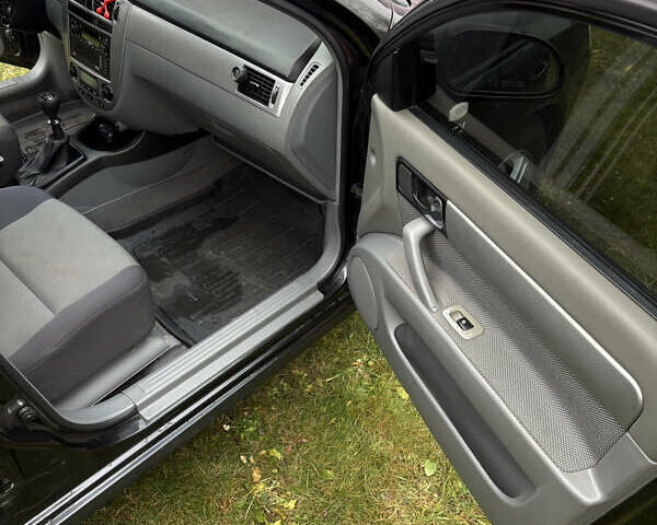 Черный Шевроле Нубира, объемом двигателя 1.8 л и пробегом 221 тыс. км за 4700 $, фото 18 на Automoto.ua