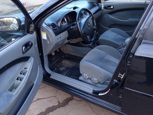 Черный Шевроле Нубира, объемом двигателя 1.6 л и пробегом 209 тыс. км за 4300 $, фото 5 на Automoto.ua