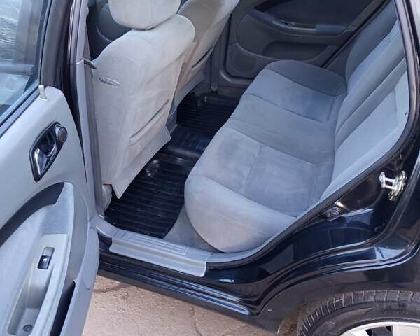 Чорний Шевроле Нубіра, об'ємом двигуна 1.6 л та пробігом 209 тис. км за 4300 $, фото 9 на Automoto.ua