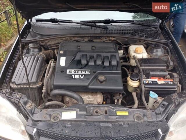 Черный Шевроле Нубира, объемом двигателя 1.6 л и пробегом 300 тыс. км за 4200 $, фото 12 на Automoto.ua