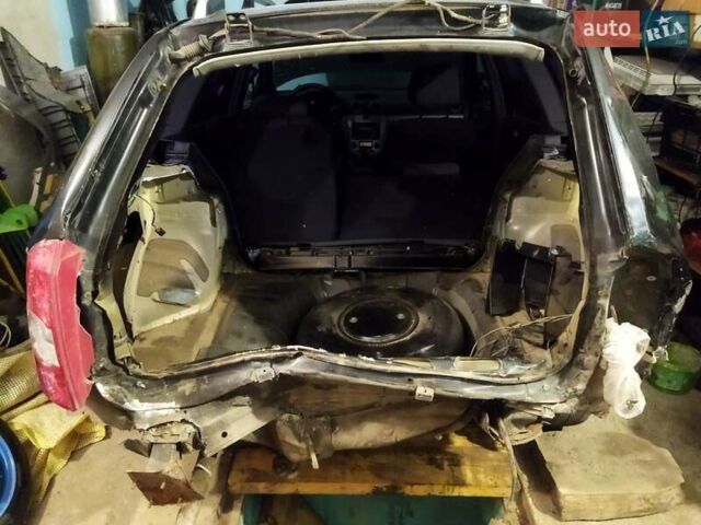 Черный Шевроле Нубира, объемом двигателя 1.8 л и пробегом 250 тыс. км за 2800 $, фото 1 на Automoto.ua