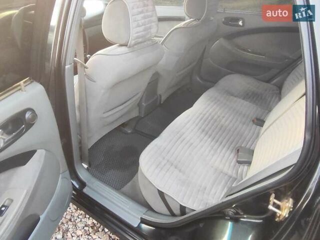 Чорний Шевроле Нубіра, об'ємом двигуна 1.6 л та пробігом 440 тис. км за 4100 $, фото 18 на Automoto.ua