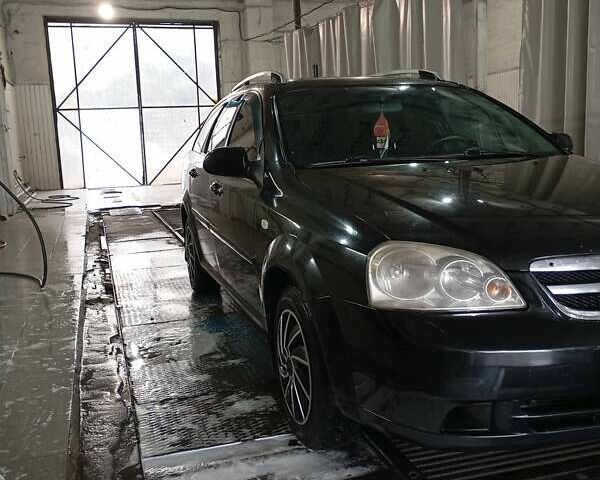 Черный Шевроле Нубира, объемом двигателя 1.6 л и пробегом 300 тыс. км за 4200 $, фото 2 на Automoto.ua