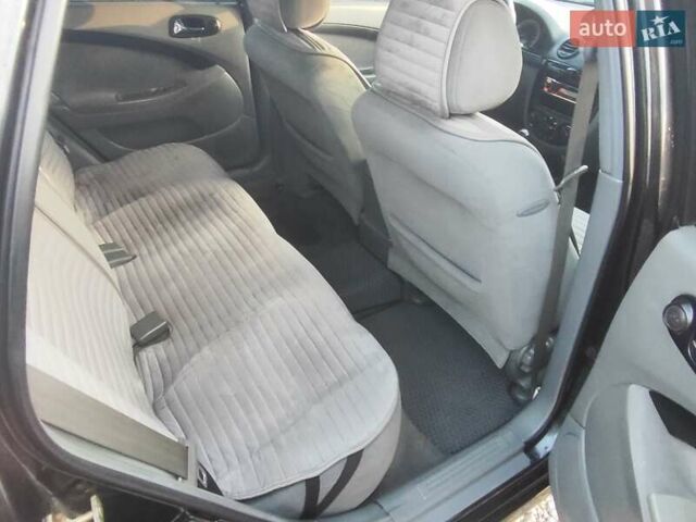 Чорний Шевроле Нубіра, об'ємом двигуна 1.6 л та пробігом 440 тис. км за 4100 $, фото 17 на Automoto.ua