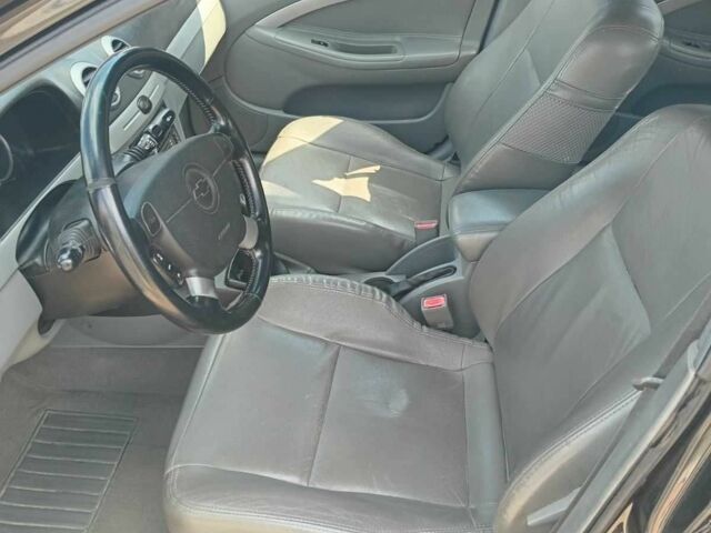 Черный Шевроле Нубира, объемом двигателя 1.6 л и пробегом 190 тыс. км за 4500 $, фото 2 на Automoto.ua