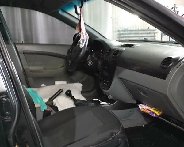 Черный Шевроле Нубира, объемом двигателя 1.6 л и пробегом 300 тыс. км за 4200 $, фото 5 на Automoto.ua