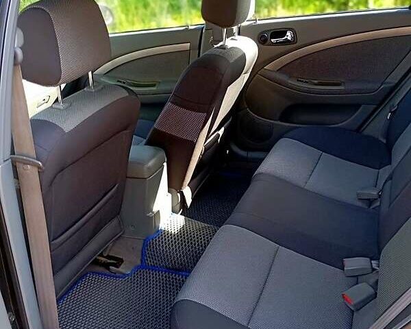 Черный Шевроле Нубира, объемом двигателя 1.8 л и пробегом 200 тыс. км за 5300 $, фото 5 на Automoto.ua