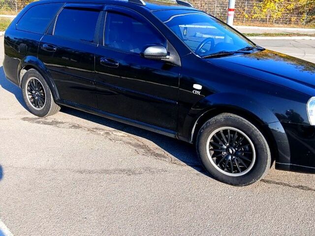 Чорний Шевроле Нубіра, об'ємом двигуна 2 л та пробігом 249 тис. км за 5600 $, фото 2 на Automoto.ua