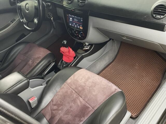 Черный Шевроле Нубира, объемом двигателя 1.6 л и пробегом 188 тыс. км за 4900 $, фото 4 на Automoto.ua