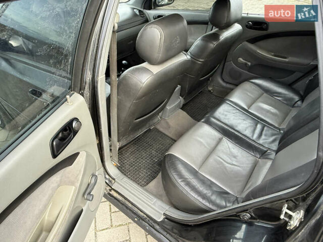 Чорний Шевроле Нубіра, об'ємом двигуна 1.6 л та пробігом 250 тис. км за 1950 $, фото 9 на Automoto.ua