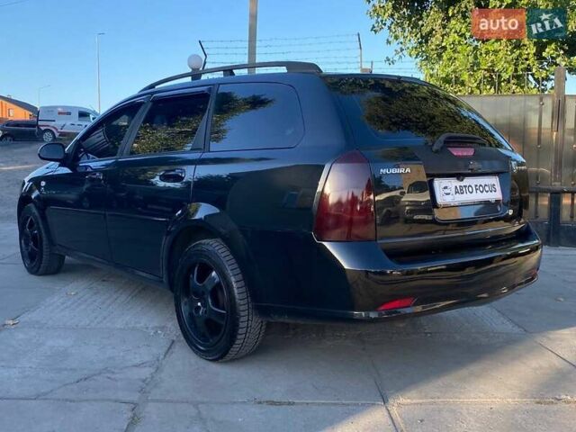 Черный Шевроле Нубира, объемом двигателя 1.8 л и пробегом 233 тыс. км за 5990 $, фото 6 на Automoto.ua