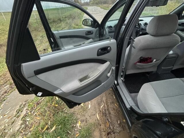 Черный Шевроле Нубира, объемом двигателя 2 л и пробегом 245 тыс. км за 5100 $, фото 4 на Automoto.ua