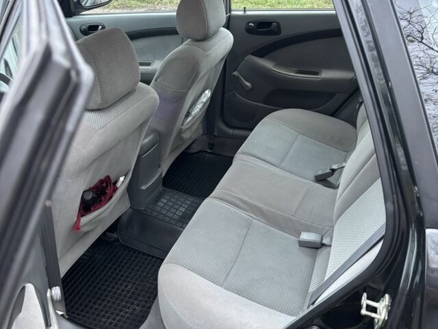 Черный Шевроле Нубира, объемом двигателя 2 л и пробегом 245 тыс. км за 5100 $, фото 6 на Automoto.ua